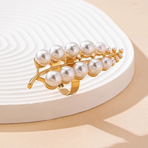 Elegant gold leaf ring with white pearls featuring an adjustable hollow opening design
