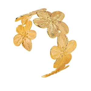 Golden flower-shaped open bangle with textured floral petals and radiant metal finish