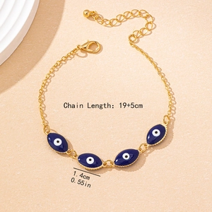 Golden Evil Eye bracelet with four blue oval pendants and 19+5cm adjustable chain