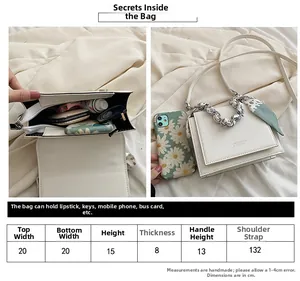 Detailed size chart and capacity display for the white PU leather crossbody bag