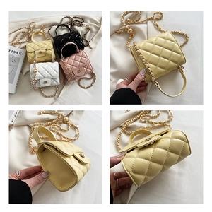 Detailed views of mini quilted crossbody bags with gold chains in four stylish colors