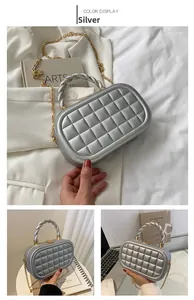 Close-up of a silver quilted box bag with woven metal handle and chain shoulder strap