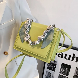 Green fashion crossbody square bag with silk scarf handle and minimalist PU leather finish