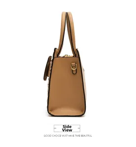 Side view of crocodile texture crossbody bag in camel with woven edge and metal details