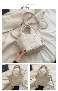 Detail of white woven leather handbag featuring large grid pattern and drawstring inner pouch