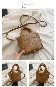Detail of a brown woven lattice handbag with detachable strap and white drawstring liner