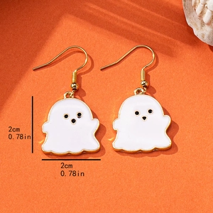 Halloween ghost earrings with white enamel and golden edges on an orange background