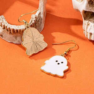 Ghost earrings for Halloween in gold and white enamel with festive orange background