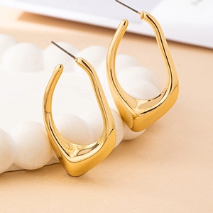 Minimalist gold irregular U-shaped geometric stud earrings with polished metallic finish