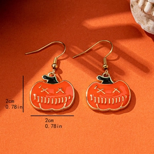 Halloween pumpkin drop earrings with Jack-O-Lantern enamel design measuring 2cm