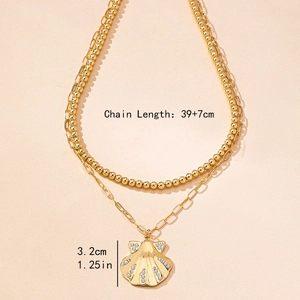 Golden double layer necklace with shell pendant and bead chain in 45-degree angle view
