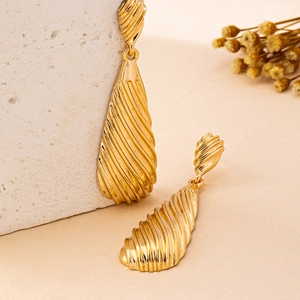 Elegant gold textured water drop tassel earrings with vintage metallic wave pattern