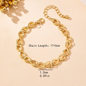 Golden Mobius infinity link bracelet with adjustable chain and lobster clasp closure