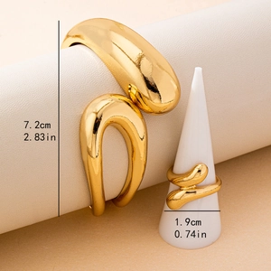 Modern gold plated irregular cuff bracelet and ring set with fluid sculptural design