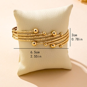 Layered gold-plated bangle set with textured patterns and 6.5cm inner diameter