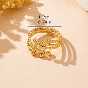 Verstellbarer goldener mehrlagiger Spiralring mit Hammerschlag-Finish und kleinen Goldkugeln