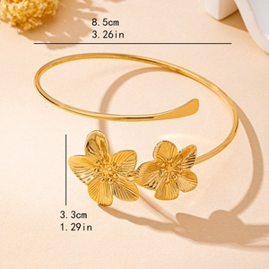 French style gold flower arm cuff with textured petals and adjustable open design