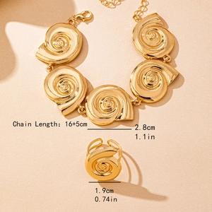 Golden spiral snail shell jewelry set with chunky chain bracelet and matching ring