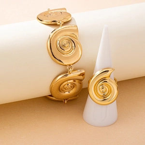 Golden spiral snail shell bracelet and ring jewelry set for beach vacation style