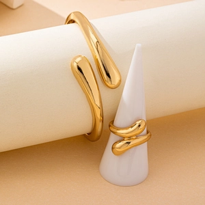 Golden teardrop open bangle and ring set with high-polish mirror finish for women