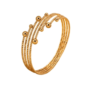 Elegant multi-layer gold plated bracelet featuring textured coils and polished metal beads
