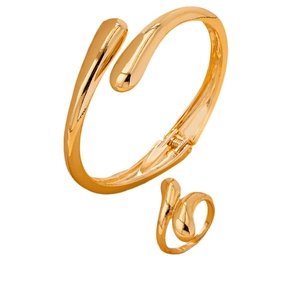 Polished gold jewelry set with fluid open cuff bracelet and teardrop shaped ring