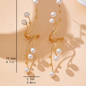 Golden vine earrings with white pearls, geometric branch design, size 10.5cm by 2.2cm