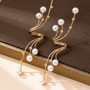 Chic gold spiral earrings with round pearls in a modern geometric drop dangle design