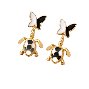 Golden turtle drop earrings with black and white checkered enamel and butterfly studs