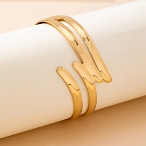 Minimalist gold multi-layer hollow open cuff bracelet with polished metallic finish