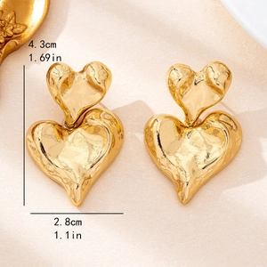 Golden double heart drop earrings with textured metallic finish and 4.3cm length