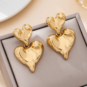 Elegant gold double heart drop earrings with a textured hammered finish for women
