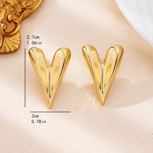 2025 INS style 3D heart-shaped gold studs featuring a minimalist geometric metal texture