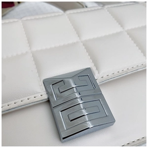 Macro view of white quilted leather texture with signature silver 4G metal lock detail