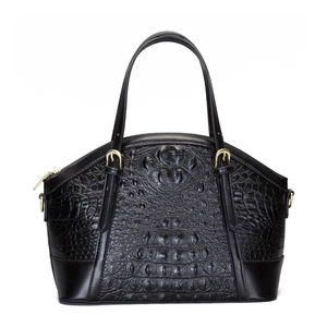 Classic black crocodile pattern handbag with dual handles and elegant gold hardware details