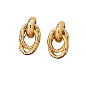 Modern intertwined gold geometric hoop earrings with polished triple ring design