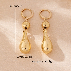 Minimalist golden teardrop earrings with measurements shown for stylish women's fashion