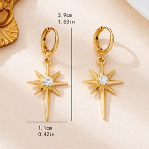 Golden North Star dangle earrings with rhinestones showing 3.9cm height measurements