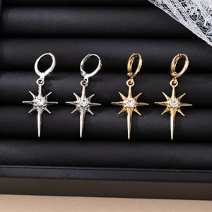 Elegant gold and silver eight-pointed star hoop earrings with sparkling crystal accents