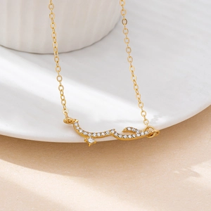 Elegant gold necklace with Arabic calligraphy pendant and pave-set white zircons