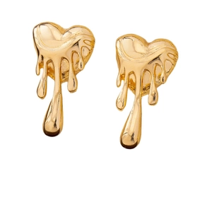 Gold liquid lava heart earrings with a unique melting metallic design on white background