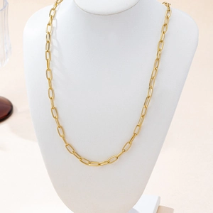 Modern minimalist gold paperclip link chain necklace for daily wear displayed on a bust