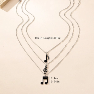 Ensemble de colliers argentés à trois couches avec pendentifs notes de musique noirs