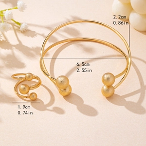 Set bracciale e anello placcato oro con sfere satinate per donna stile minimalista