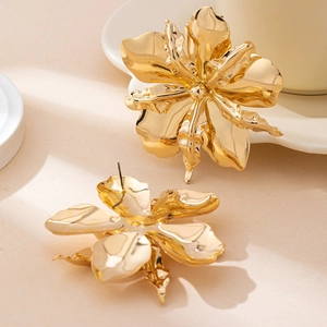 Exaggerated gold 3D flower stud earrings in irregular minimalist floral design