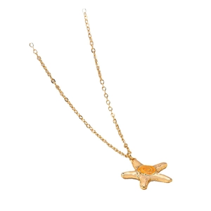 Golden starfish pendant necklace with textured detail and orange spiral on a chain