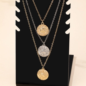 Three-piece retro sun face pendant necklaces set in mixed gold and silver finish