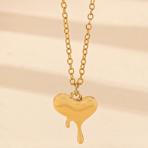 Elegant gold-plated lava heart pendant necklace with high-polished liquid metal finish
