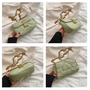 Multi-angle view of mint green quilted chain bag with V-shaped and heart stitching
