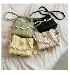 Fashionable crossbody bags with wave texture, wood buckle, and silk scarf chain details